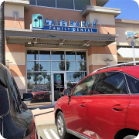 Two cars parked in front of Bishop Ranch Family Dental